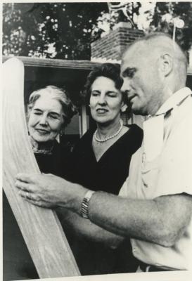 Eleanor Lee Templeman, Leone Buchholtz, and John Glenn Signing a Ski 
