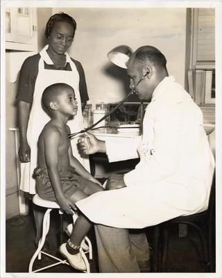 Child Being Examined at Clinic