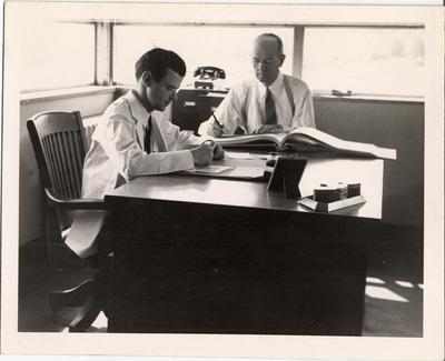 Arlington County Staff Checking Records