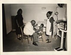 Preschool Child Being Examined by Doctor, 1943