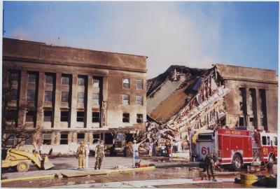 Rescue Engine 61 Assisting at the Impact Site
