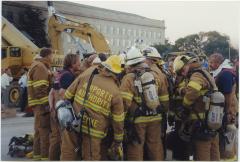 Firemen Huddling
