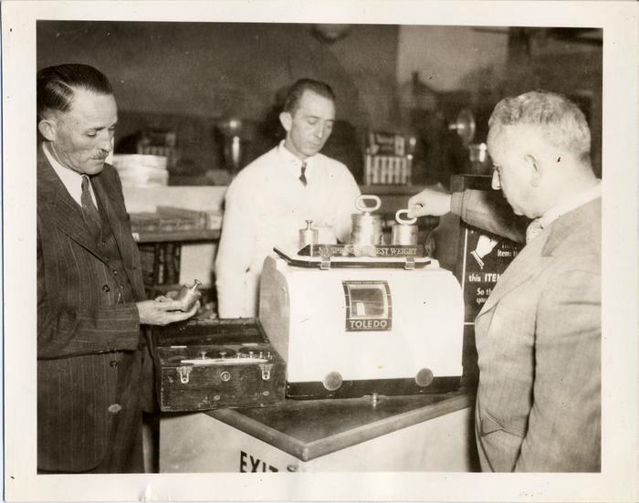 Inspection of Scales at Grocery Store, 1942