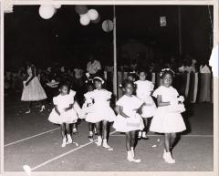Group of Girls in Outdoor Procession for Pageant