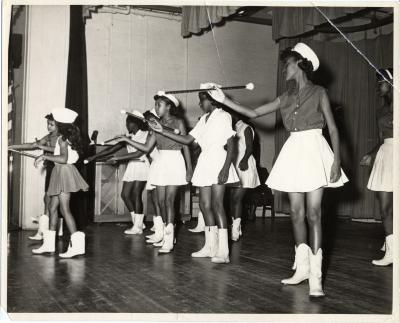 Drum Majorettes Practicing with Batons