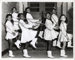 Child Drum Majorettes Posing with Batons in Costume