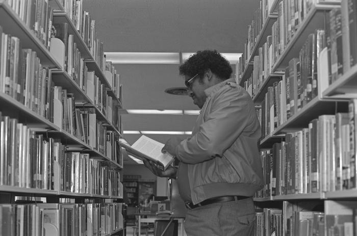 Reading a Book in the Library
