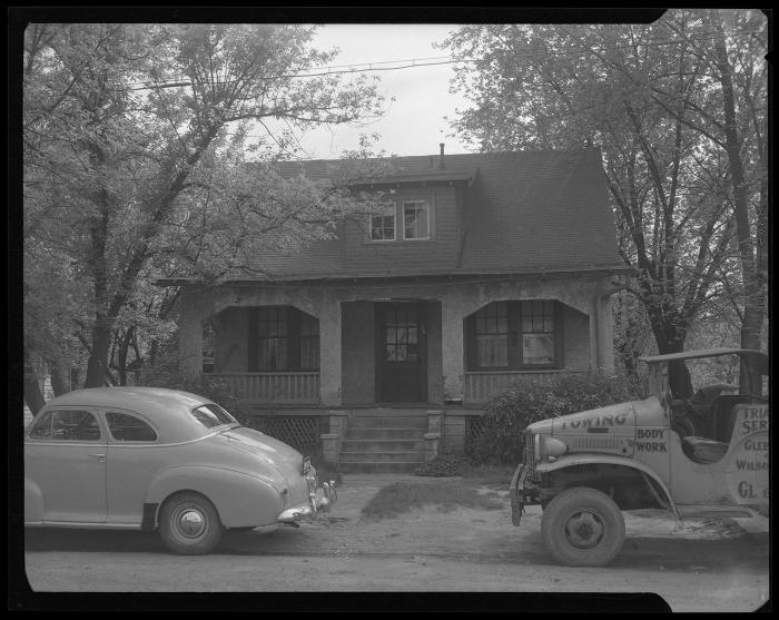 Triangle Service Truck in Front of Home