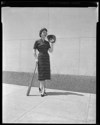 Woman with Bat and Glove