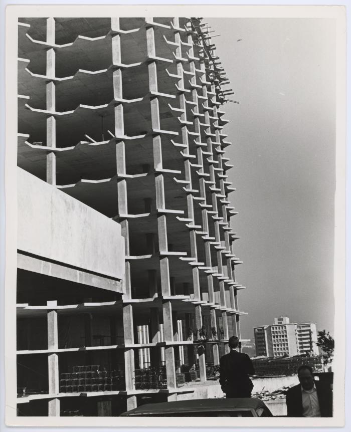 Men in the Shadow of Rosslyn Construction