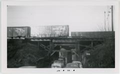 Cars Under Rail Bridge