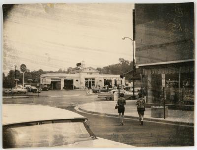 People Crossing the Street Near Gulf Auto