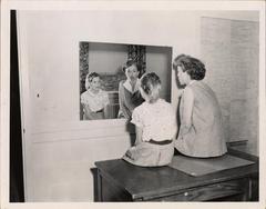 Speech therapist with child patient, 1958