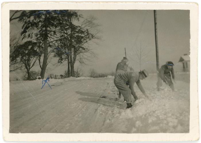Men Playing In Snow