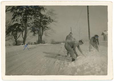 Men Playing In Snow