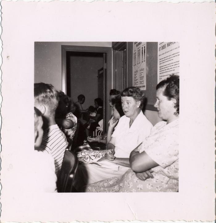 People Sitting in Meeting.