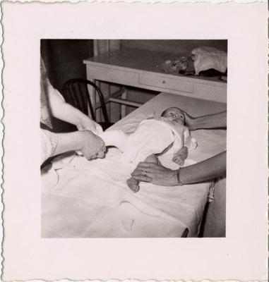 Infant Being Examined at Orthopedic Clinic