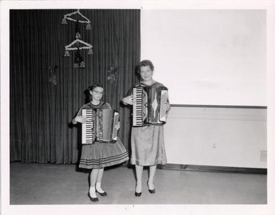 Accordionists performing at Crippled Children's Christmas party, 1958