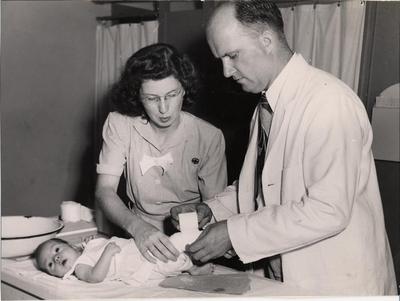 Examination of Infant by Public Health Nurse and Doctor