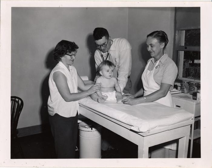 Health examination at child health clinic, 1958